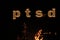 PTSD Medical abbreviation or acronym of post traumatic stress syndrome, mental disorder caused by traumatic events. Word PTSD on f