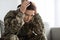 PTSD And Veterans. Depressed Woman In Military Uniform Touching Head In Despair