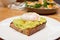 Puached egg, avocado and grilled bread