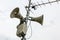 Public address system speakers on a pole, antenna and box with n