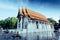 public ancient old white vihara hall buddha in Trirattanaram temple.