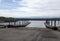 Public boat launch jetty into the ocean in a park on a summer day