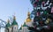 Public Christmas trees and domes of the cathedral