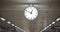 Public circle clock In a railway station with roof, Black and white classical public hanging clock,The main railway station.