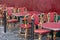 Public dining area with colourul chairs and tables