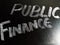 Public finance text displayed on chalkboard concept