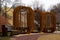 Public gazebos made of wood, of unusual shape.