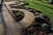 public, herb, nature garden with metal corten numbers.