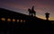 The public monument of `Sao Longuinho`, famous statue silhouette at sunset in Bom Jesus do Monte, Braga, Minho.