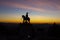 The public monument of `Sao Longuinho`, famous statue silhouette at sunset in Bom Jesus do Monte, Braga, Minho.