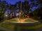 Public park fountain at nighttime in Cortona, Tuscany