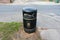 Public rubbish bin overfilled with trash