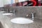 Public sinks, Handwashers for people using public toilets