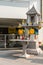 Public small Buddhist shrine in street of Bangkok, Thailand