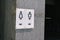 Public toilet. Signboard with the inscription male and female toilet. Toilet signage and toilet warning signs