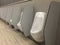 Public urinal seal by plastic for social distancing when covid 19 crisis