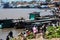 pucallpa peru, ucayali river with boats transporting banana fruits and workers