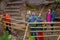 PUCON, CHILE - SEPTEMBER, 23, 2018: Outdoor view of unidentified people walking close to the waterfalls with a wooden