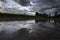 Puddle reflection on a prairie road