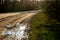 Puddles on the country road in Latvia