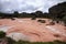 Puddles in unique pink sand of mount Roraima