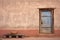 pueblo door: weathered wood against adobe wall