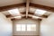 pueblo wooden ceiling beams contrasting against light colored walls