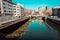 Puente de la Merced in Bilbao, reflections on the Ria de Bilbao on a sunny day