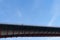 Puente de los Santos, with cyclist. Border of Asturias and Galicia, Spain. View from below with sky background.