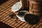 Puer tea with golden toad on a bamboo mat.