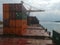 Puerto de Sagunto, Spain 11 /03/2020: Barco de mercancias cargando contenedores
