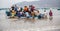 Puerto Lopez, Ecuador / Nov 26, 2012: Workers swarm small fishing boat