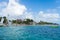 Puerto Morelos seaside view with sea and boats. Caribbean sky with clouds. White sand shore. Background or wallpaper. Yucatan. Qui