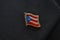 Puerto Rico flag lapel pin on a suit