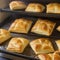 Puff pastries browning in the oven