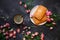 Puff pastries and coffee, Sweets and flowers, Dark background, Top view, March 8, Women`s Day