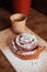 Puff pastry cakes curl with powdered sugar on top. A close-up of a bakery product. Confectionery work and customer service. A