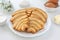 Puff pastry fans, on a white background with the ingredients