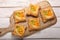 Puff pastry with fruits on a wooden background