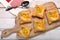 Puff pastry with fruits on a wooden background