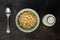 Puffed wheat covered with honey in bowl and milk