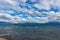 Puffy clouds above a Lake Tahoe pier