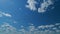 Puffy fluffy white cloud. Summer blue sky background. Time lapse.