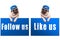 Pug puppy dog with follow us and like us sign and wearing blue cap, islolated on white background