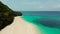 Puka Shell Beach. Wide tropical beach with white sand. Beautiful white beach and azure water on Boracay island