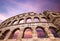 Pula amphitheater with light pink sky