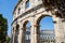 The Pula Arena Facade. Ancient Roman Amphitheatre with Restored Arched Walls Located in Croatia. Well Preserved Monument