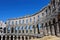 Pula, Croatia - 07 07 2022: Photography of ancient walls and architectural detail of arena in Pula from Roman period.