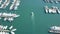 PULA, CROATIA - AUGUST 2, 2017. Aerial shot of speeding motorboat near marina piers