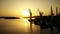 PULA, CROATIA - AUGUST 5, 2017. Aerial view of the Uljanik shipyard cranes silhouettes at sunset